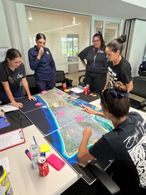 Workshop participants observe fire behaviour 2025 low