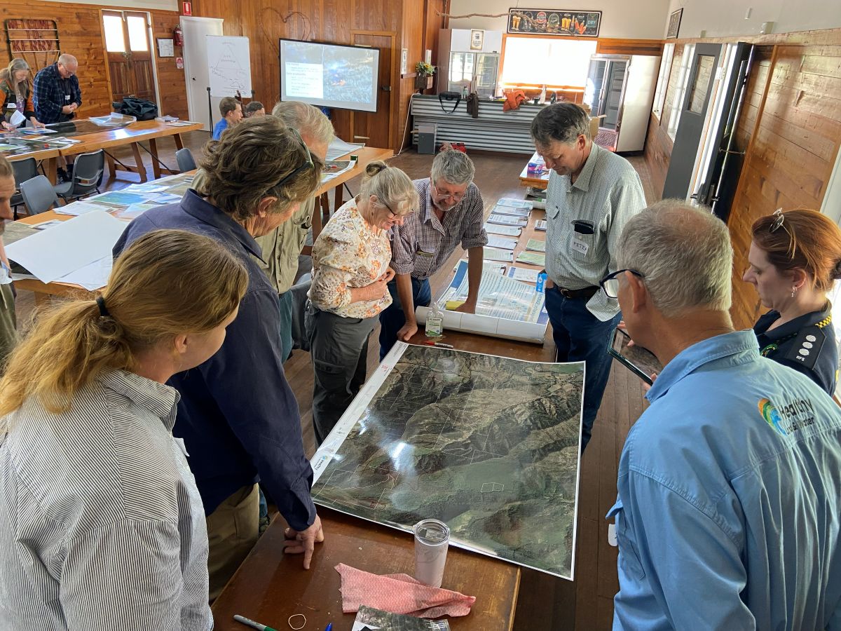 NRRP photo of people looking at map 2025 low